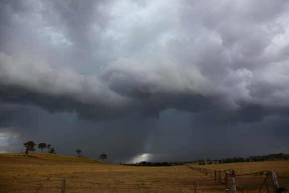 Storm intensifies rapidly  Hail to 1.5cm was observed in this - some settled in drifts on side of the road washed off by