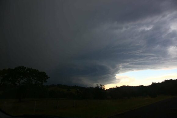 Supercell hiding behind the hills
