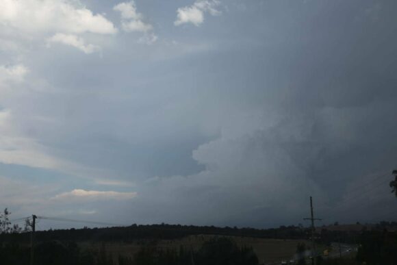 Very large storm to the east showing explosive development as the upper trough en trains the region