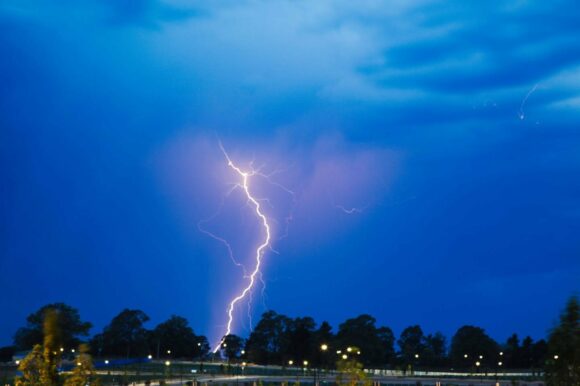 Almost centred - nice tall branched lightning flash.