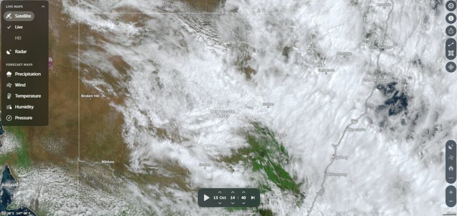 Large areas of cloud covers New South Wales during Tuesday as another weather system brought widespread rain across large areas of the state. The Sydney event Tuesday night was one of the standout events that occurred. (Source - NASA Zoom Earth 13/10/2026)